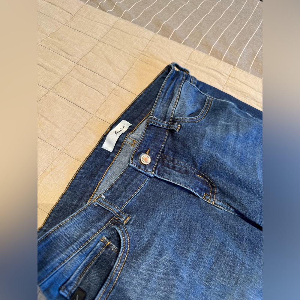 Kancan Houston Low Rise Frayed Hem Boot Cut Jeans.